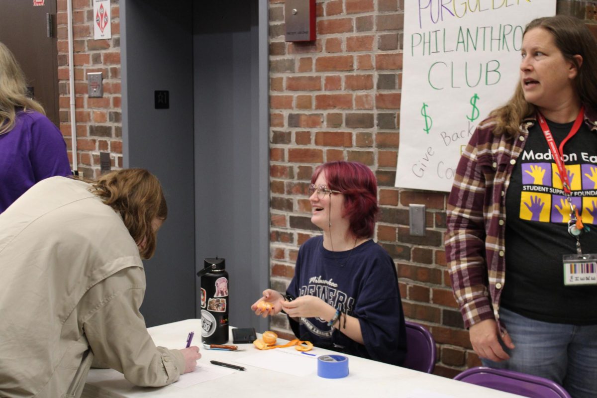 Sophomore Jasper Keitt-Pride runs the Crafting 4 a Cause table during the Club Fair at lunch on Sept. 5. The new club meets every other Wednesday at lunch in room 1506. 